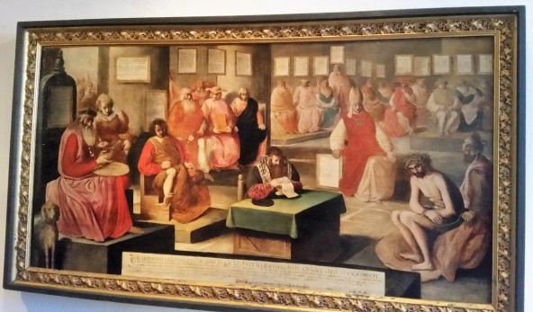 Panel depicting The Unjust Judgment of Christ, painted in 1562, southern German artist unknown – on the left stands Pontius Pilate washing his hands of guilt; below right is Jesus with the crown of thorns on his head; in the centre are people, including a pope, making accusations against Jesus – their opinions are written on tile panels above their heads. The representation is based on documents from Jesus' time found in the 16th century in Vienne (France) and Aquila (Italy). The documents later turned out to be false.